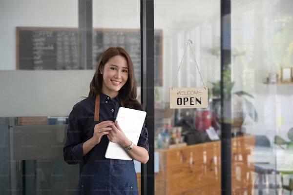 Women standing in front of a store